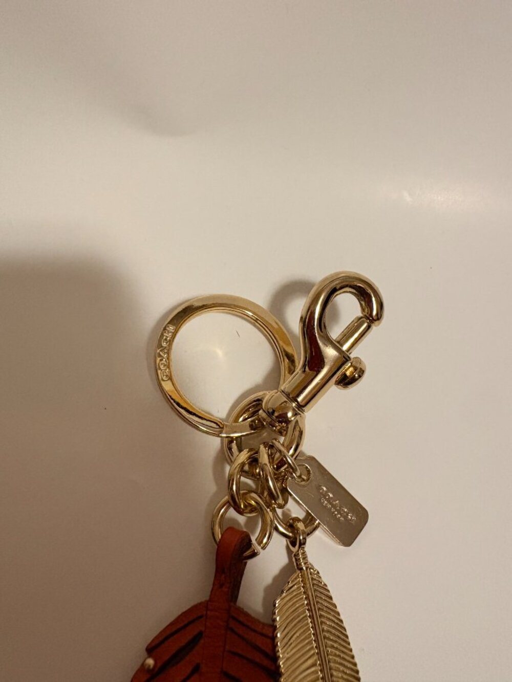 Coach Feather Bag Charm 89414 Orange Leather Silver Feather Keychain - Picture 3 of 4